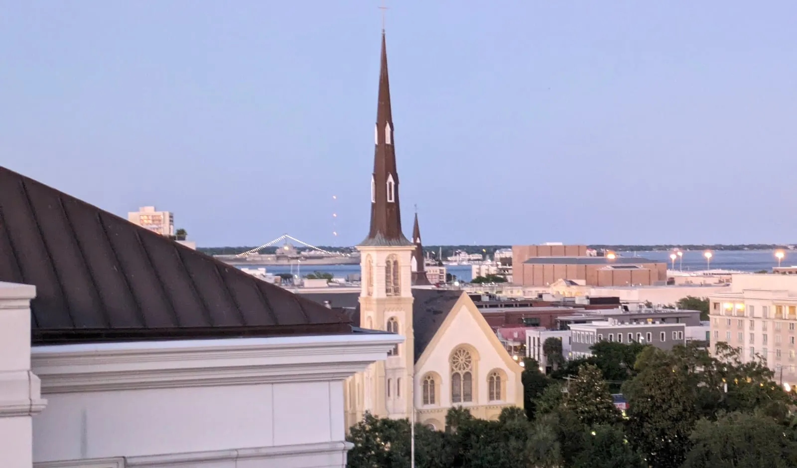 Charleston, SC skyline at dusk over Marion Square, home of NGS